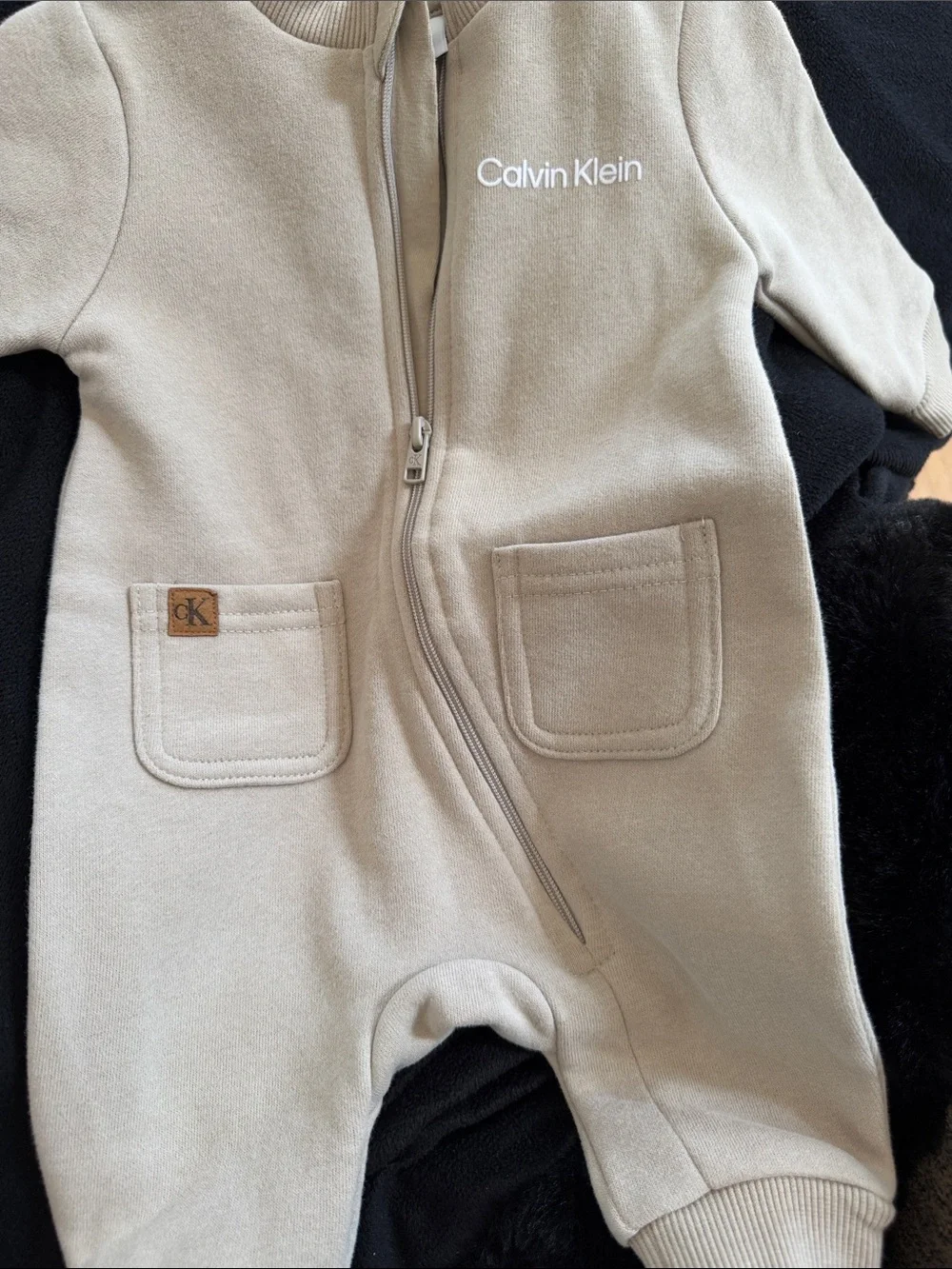 Calvin Klein Kids Neutral Beige One-Piece with Front Zip